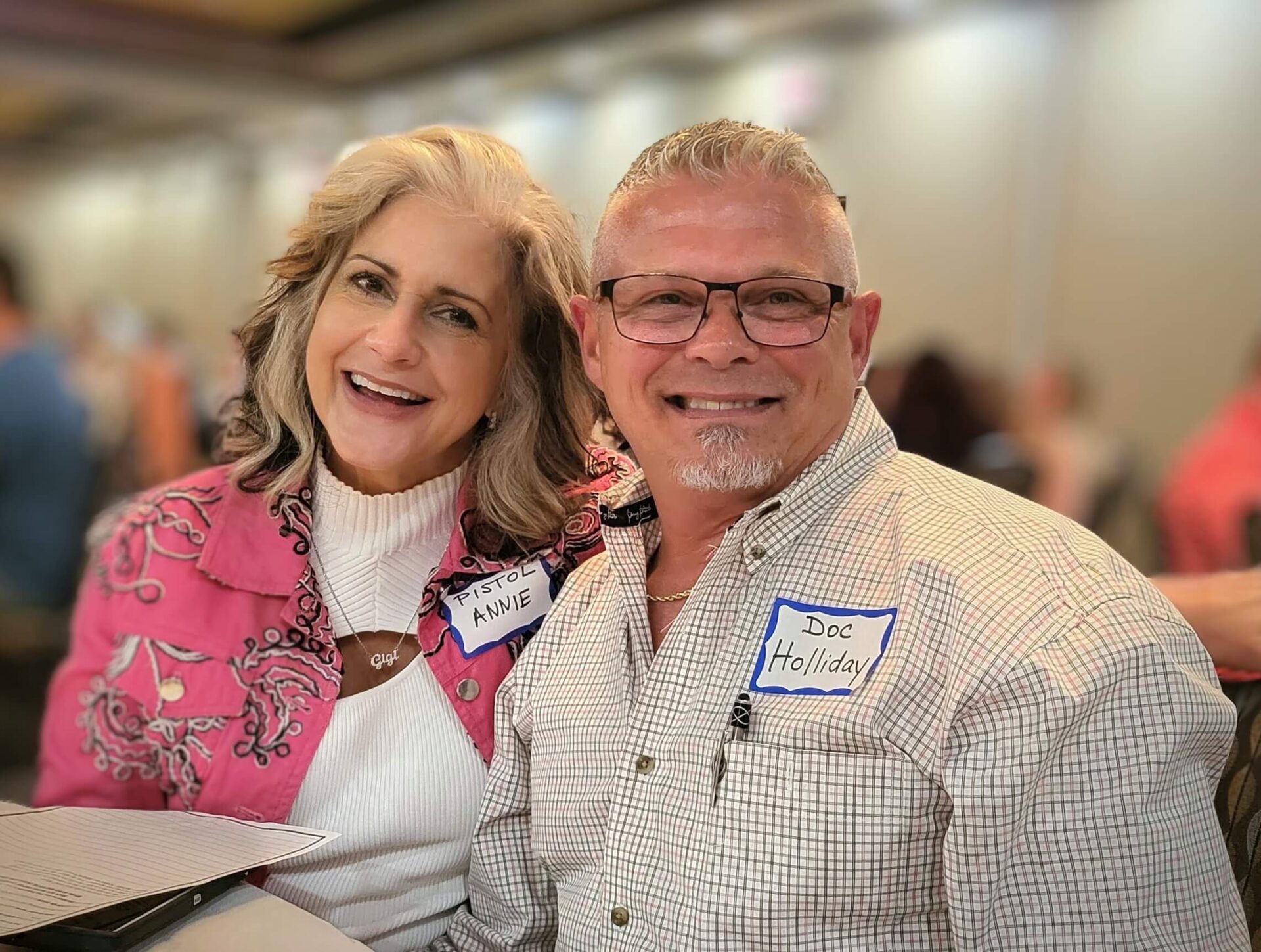 A man and woman posing for the camera.